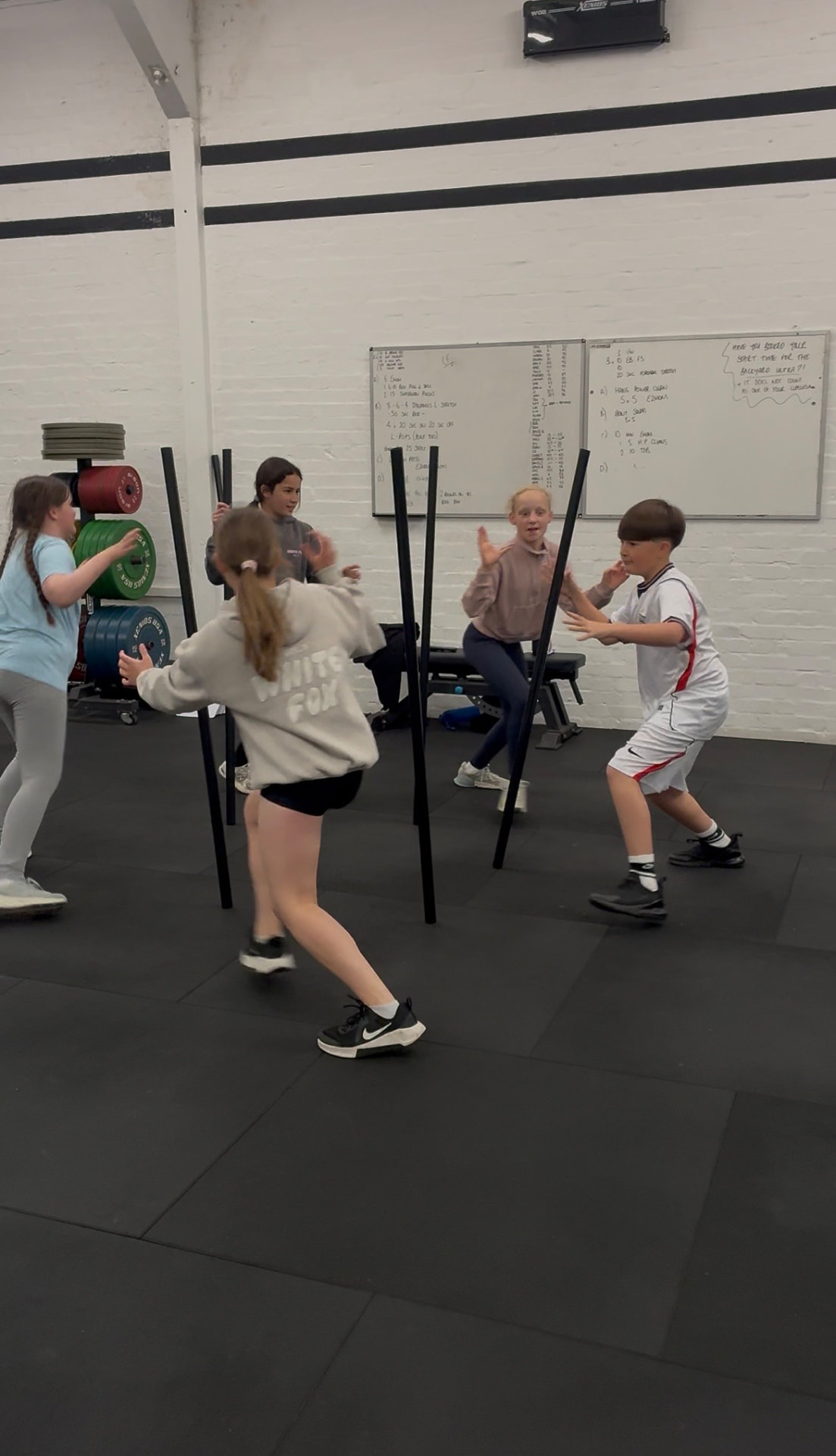 Children playing a team game in a CrossFit Kids session at Grand Union CrossFit